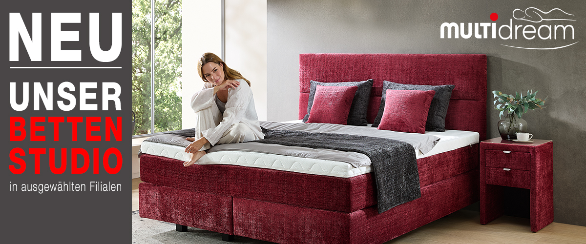 Bettenstudio neu bei Multipolster Bild mit Text und rotem Boxspringbett mit Model